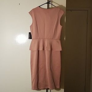 Never worn peplum dress